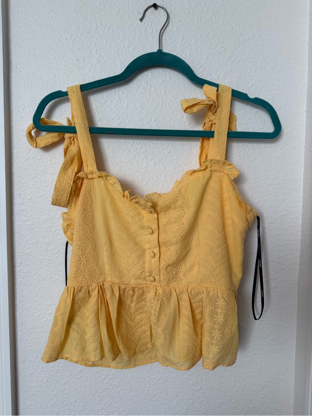 Forever 21 Yellow Eyelet Tie-Shoulder Peplum Camisole